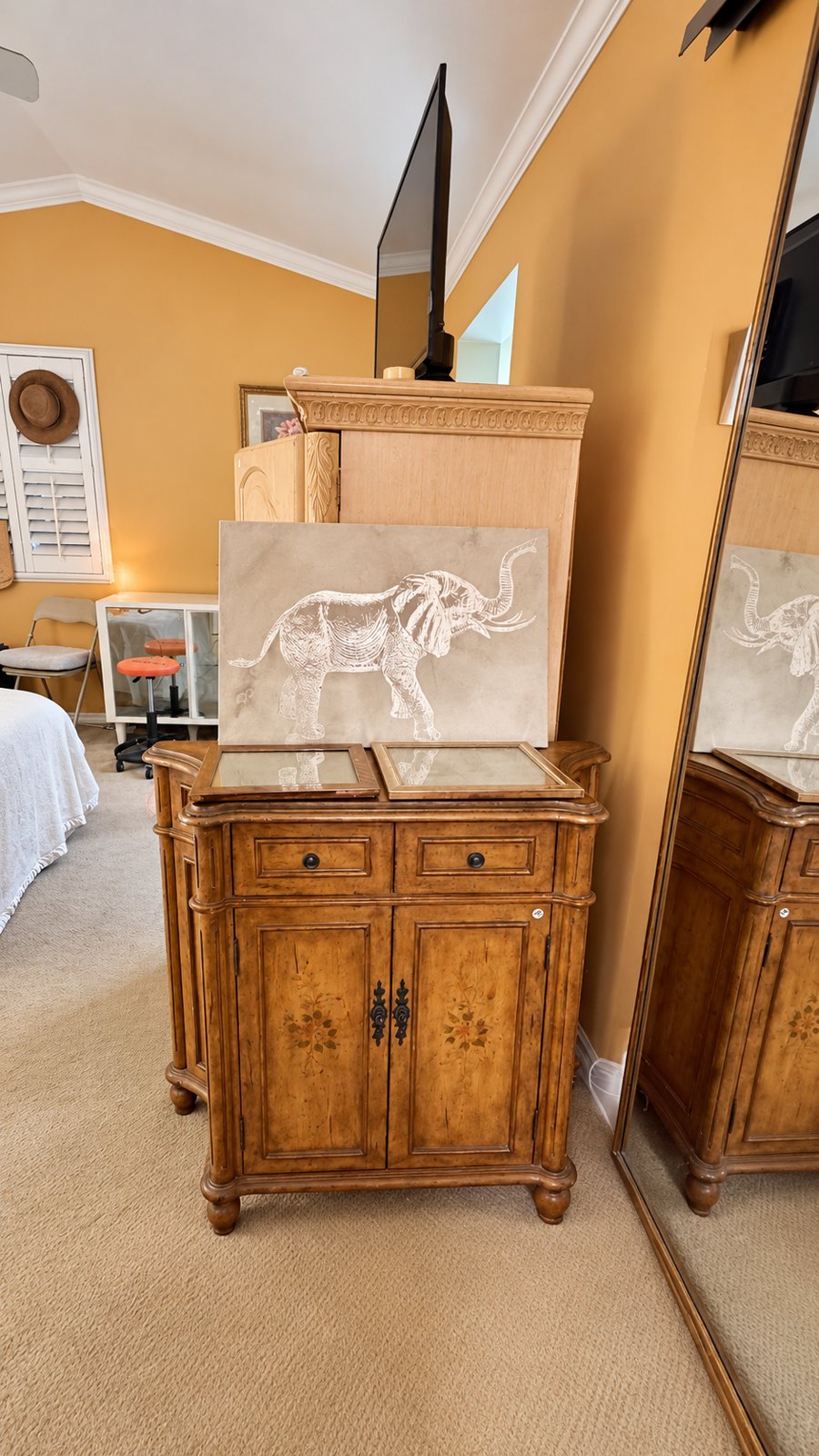 Wood cabinet and elephant art